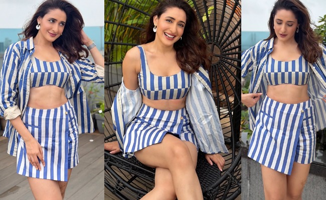 HOT: Thunderous Thigh Show In Blue Stripes