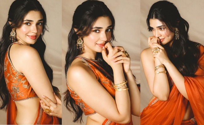HOT: Kalyan Ram's Heroine Stuns In Orange Saree