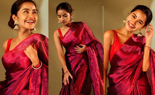 HOT: Lady Stuns In Sleeveless Blouse