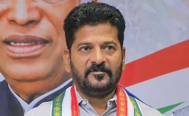 Revanth Blasts Centre for Refusing Clearance for US Tour